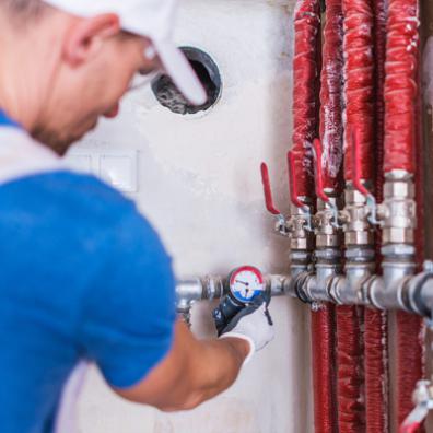 Image of plumber working