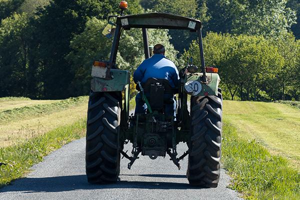 Image of a tractor on a country road